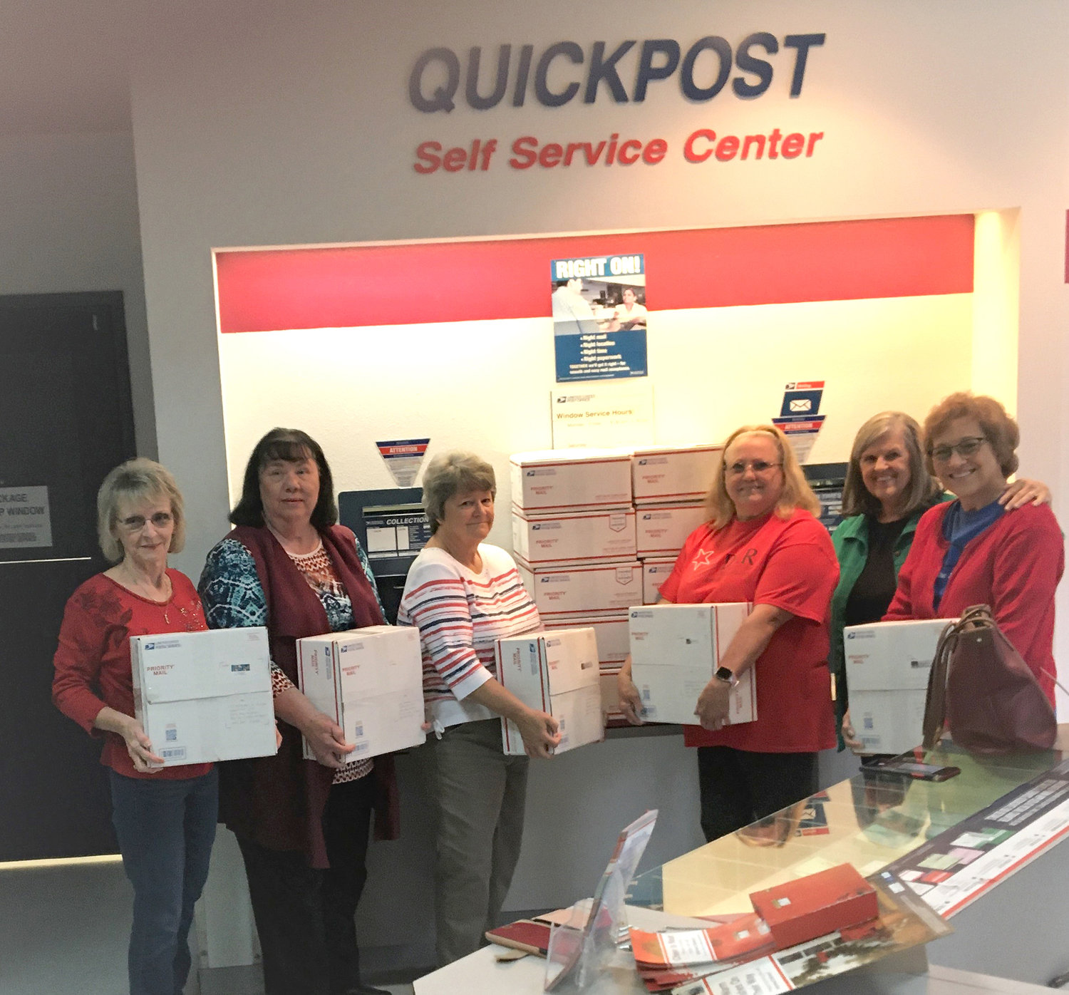 Susan Few, Karen Pilgrim, Linda Haddock, Helen Stipe, Barbara Vogl and Brenda Martinez with the local DAR chapter prepare to mail care packages to troops overseas. (Courtesy photo)